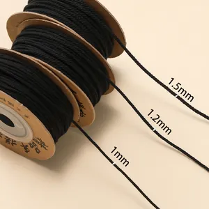 Drie rollen zwart katoenen koord in 1mm, 1,2mm en 1,5mm diameters voor DIY-sieraden weven