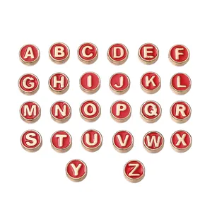 Full set of 26 red and gold round alloy alphabet beads for DIY jewelry.
