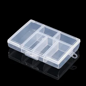 Detailed macro view of a 6-grid clear plastic jewelry organizer box with a secure latch.