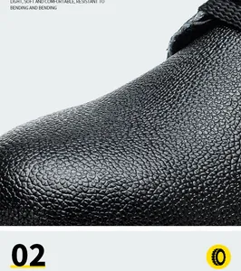 Close-up detail of the 10KV insulated leather work shoe texture showing high quality cowhide.