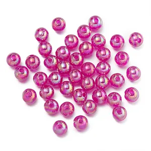 Vibrant magenta AB iridescent plastic beads for DIY jewelry and phone charms.