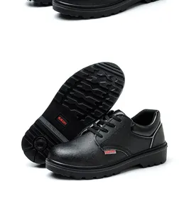 Detailed view of 10KV insulated black leather safety shoes showing anti-slip sole pattern