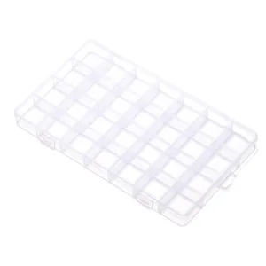 Detailed high-angle view of a clear 28-grid plastic storage box for DIY jewelry items