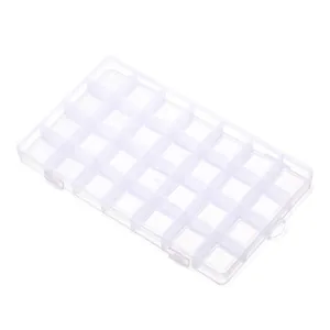 Detail of 28-grid clear plastic storage box for DIY jewelry and beads organization