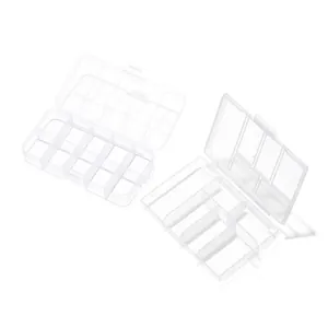 Detailed view of open transparent plastic storage boxes showing multiple compartments