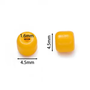 Dettaglio di perle in vetro giallo da 4,5 mm con misure per il fai-da-te creativo