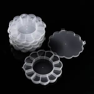 Detailansicht der blumenförmigen transparenten Kunststoffbox mit mehreren Fächern