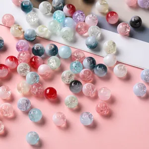 Macro detail of various colorful crackle glass beads for DIY jewelry making and crafts