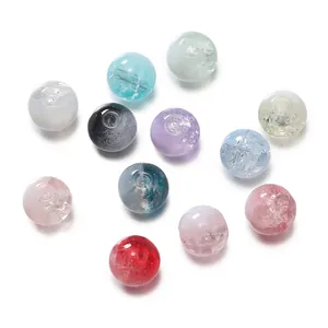 Detailed view of colorful cracked glass beads for handmade DIY jewelry crafting