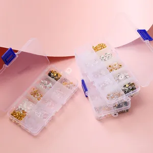 Detailed view of 10-compartment storage box filled with mixed silicone and metal earring backs