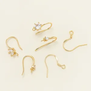 Detail of 18k gold plated earring hooks with cubic zirconia for DIY jewelry making.