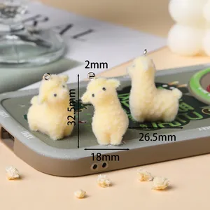 Schattige gele geflockte alpaca bedeltjes voor DIY telefoonhoesjes en sleutelhanger accessoires.