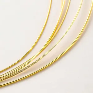 Macro view of shiny 14K gold filled copper wire with metallic luster for DIY jewelry making