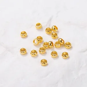 High-quality close-up of golden stainless steel spacer beads for DIY jewelry making