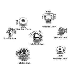 Detailed measurements of assorted silver CCB beads in star, heart and oval shapes