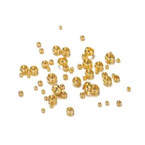 High quality macro detail of various sizes gold plated stainless steel spacer beads
