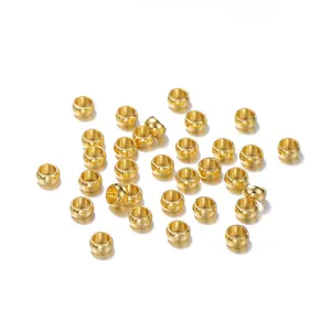 Detail view showing the high-quality gold-plated finish on stainless steel spacer beads.