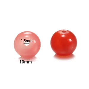 Primer plano de cuentas de vidrio de 10mm color gelatina con agujero de 1,5mm