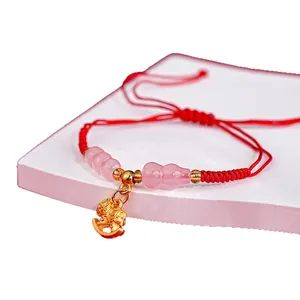 Elegant Chinese style red string bracelet with gold rocking horse charm and pink beads