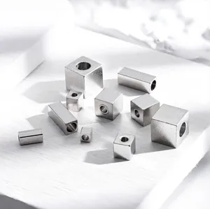 Macro view of stainless steel cube spacer beads for handmade DIY jewelry making
