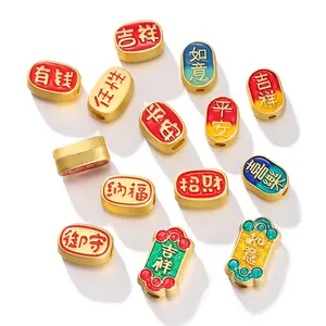 Detailed view of Chinese style matte gold enamel charms with blessing characters for DIY jewelry