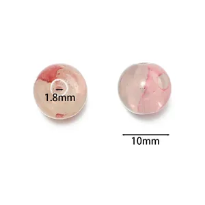 Macro view of 10mm floral glass beads showing detailed hole diameter and size dimensions