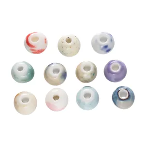 Assorted handcrafted ceramic beads with colorful marbled and speckled designs for DIY jewelry
