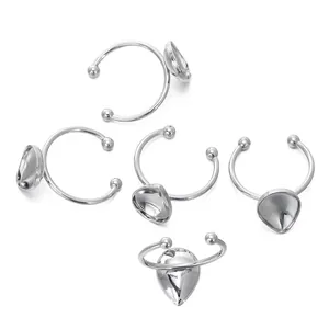 Multiple silver stainless steel teardrop ring bases for DIY jewelry making hobby