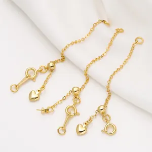 Detailansicht der 18K vergoldeten Verlängerungsketten mit Herzanhänger für DIY Schmuck.