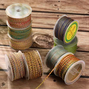 Close-up detail of multi-colored 2.5mm braided jewelry cords on plastic spools