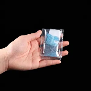 Small pack of tiny iridescent blue bubble beads for DIY resin art jewelry filling