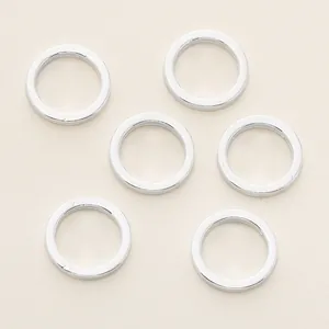 Lot de six anneaux fermés en cuivre argenté pour création de bijoux