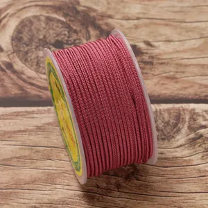 Close-up detail of 2.5mm maroon braided nylon cord for DIY jewelry making crafts