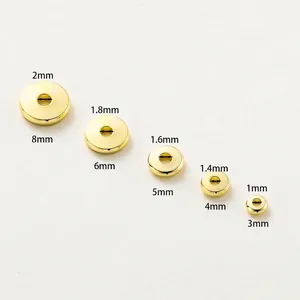 Gold plated copper wheel spacer beads showing multiple sizes from 3mm to 8mm