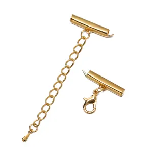 Detail showing gold slide tube clasps with extension chain and lobster clasp