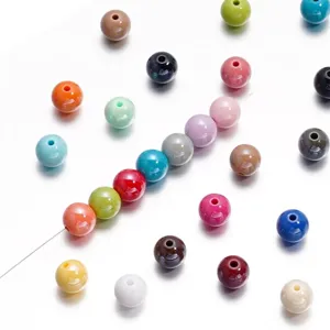 Macro view of multi-colored 10mm iridescent acrylic beads for DIY jewelry making
