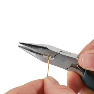 Macro shot of a 5-inch long nose jewelry plier bending a thin craft metal wire.