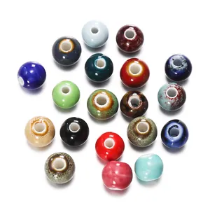 Close-up detail of multi-colored glazed round ceramic beads for DIY jewelry and necklaces