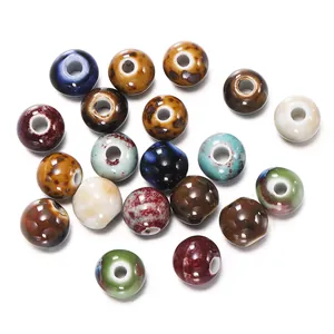 Collection of multi-colored kiln-glazed ceramic beads with center holes for DIY