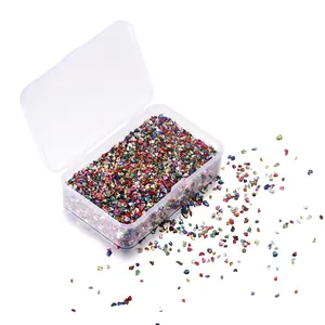 Detailed view of colorful irregular crushed glass stones for DIY nail art crafts