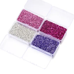 Multi-colored irregular crushed glass stones for DIY jewelry and nail art decoration.