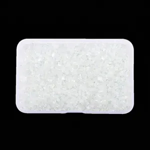 Irregular iridescent glass crushed stones in a storage box for nail art DIY.