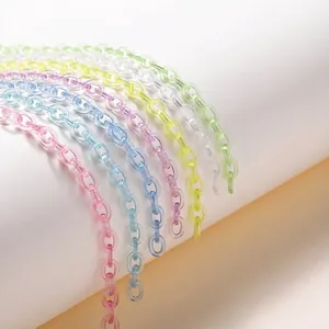Close-up of translucent colorful acrylic link chains for DIY phone and bag accessories