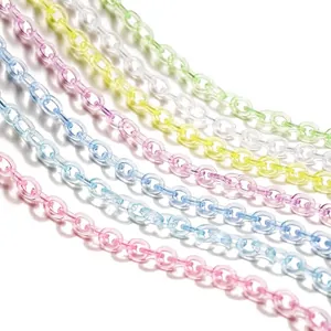 Close-up of colorful transparent acrylic chain links for DIY accessories.