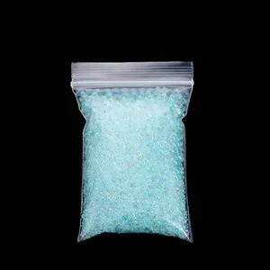 Close-up detail of 20g non-perforated iridescent glass micro-beads for nail art DIY