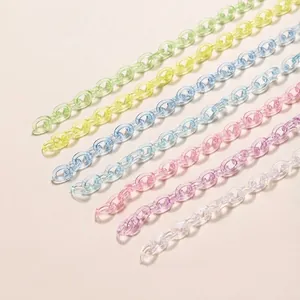Close-up of colorful transparent acrylic DIY chains for phone and bag accessories DIY