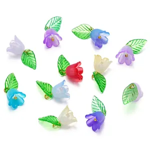 Detailed view of colorful acrylic flower and leaf pendants for DIY jewelry making