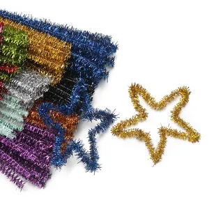 Close-up of various colorful glitter pipe cleaners and a handmade DIY star shape detail
