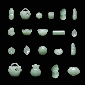 Detailed size specifications for various vintage green faux jade glass charms for DIY jewelry.