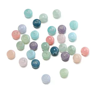 Detailed view of 10mm multi-colored cracked opal glass beads for DIY jewelry making.